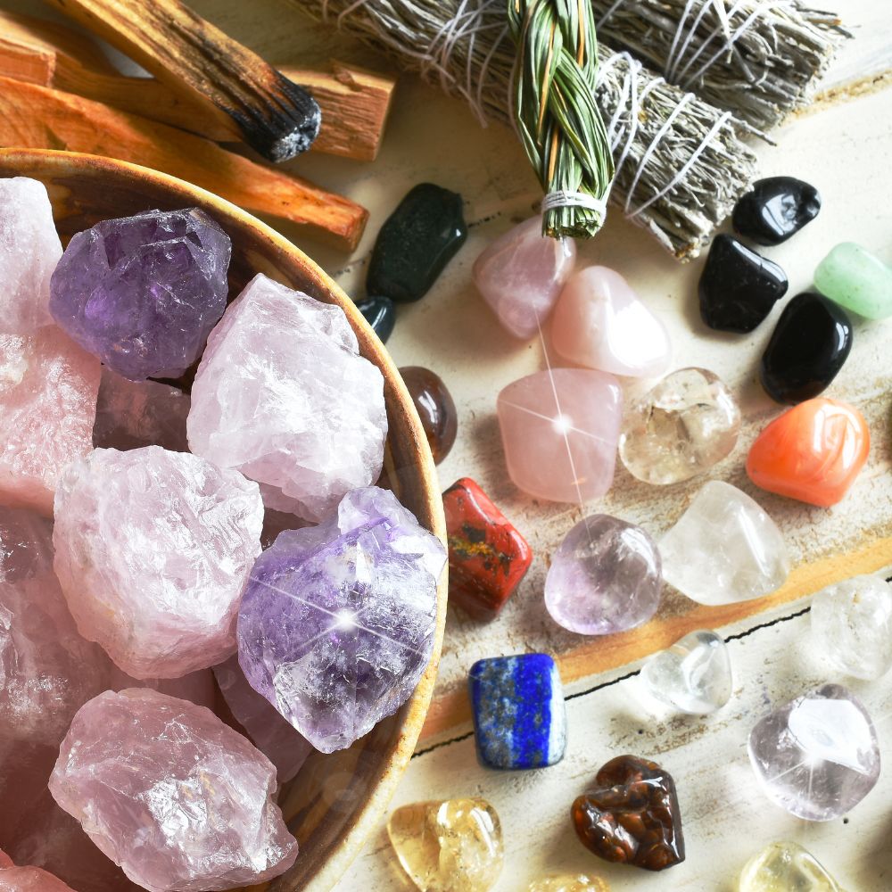 crystals and sage on table