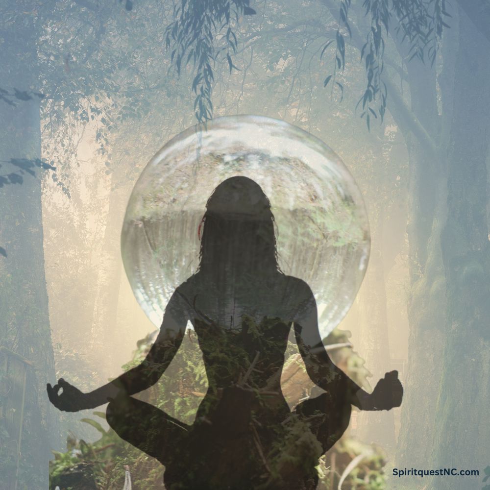 girl meditating in forest in front of clear globe